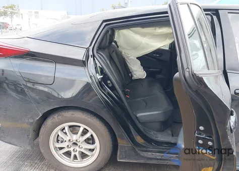 2021 Toyota Prius Prime Limited z USA, uszkodzony, nr VIN JTDKAMFP0M3171403